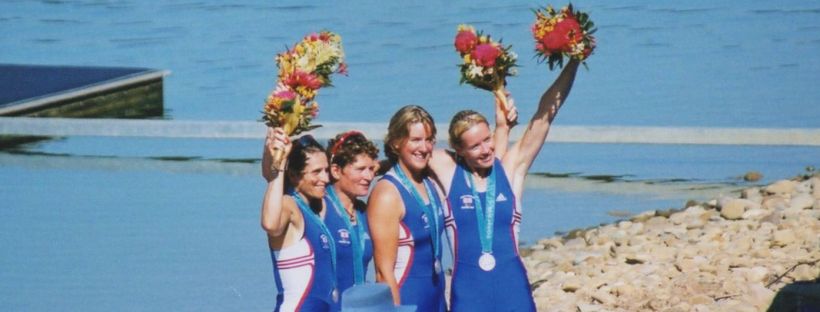 4 women at Sydney Olympics with silver medals and bouquets
