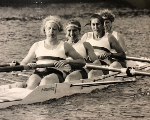 Black and white photo of women's coxless four